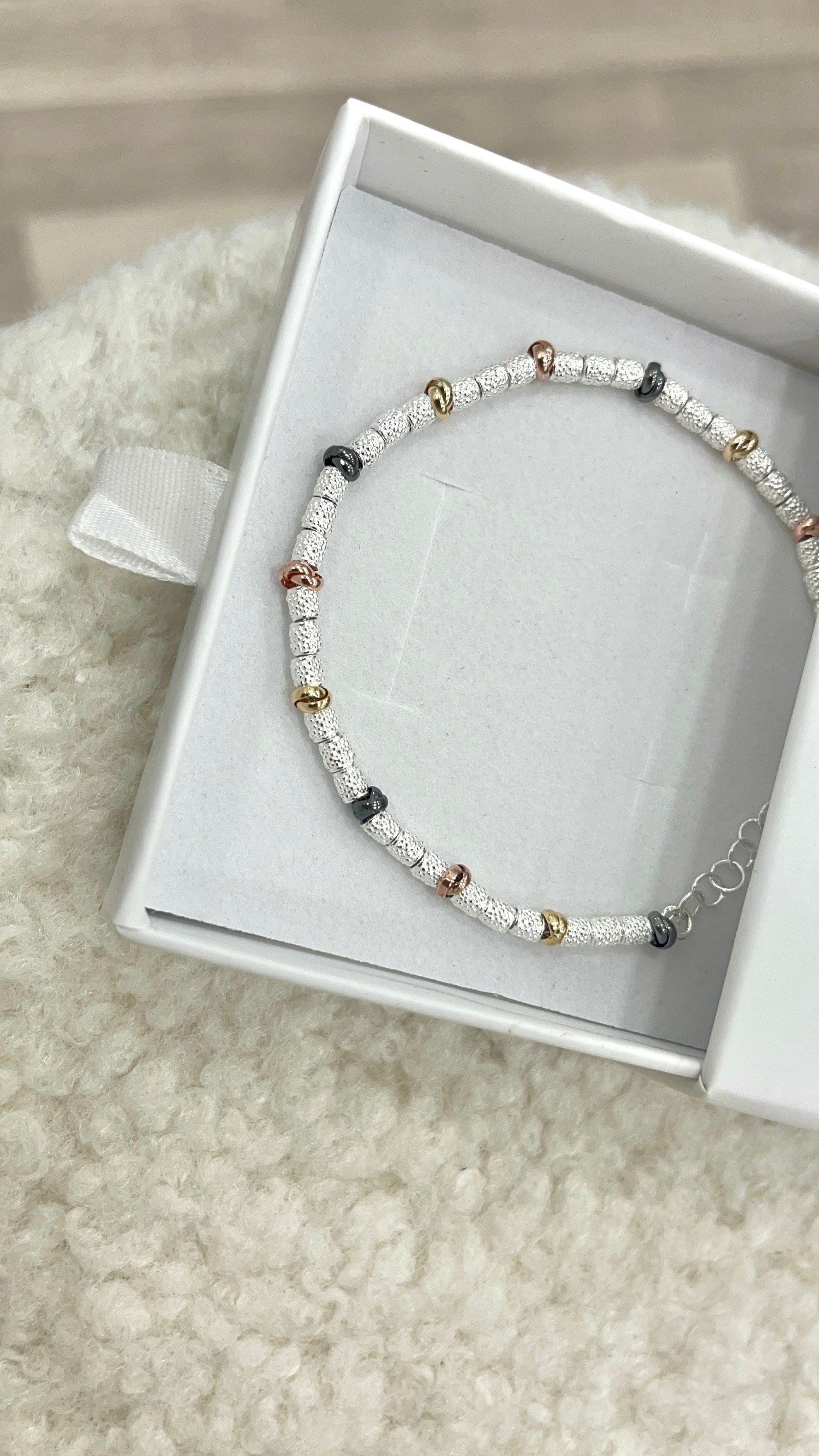 Bracciale nodini tre colori