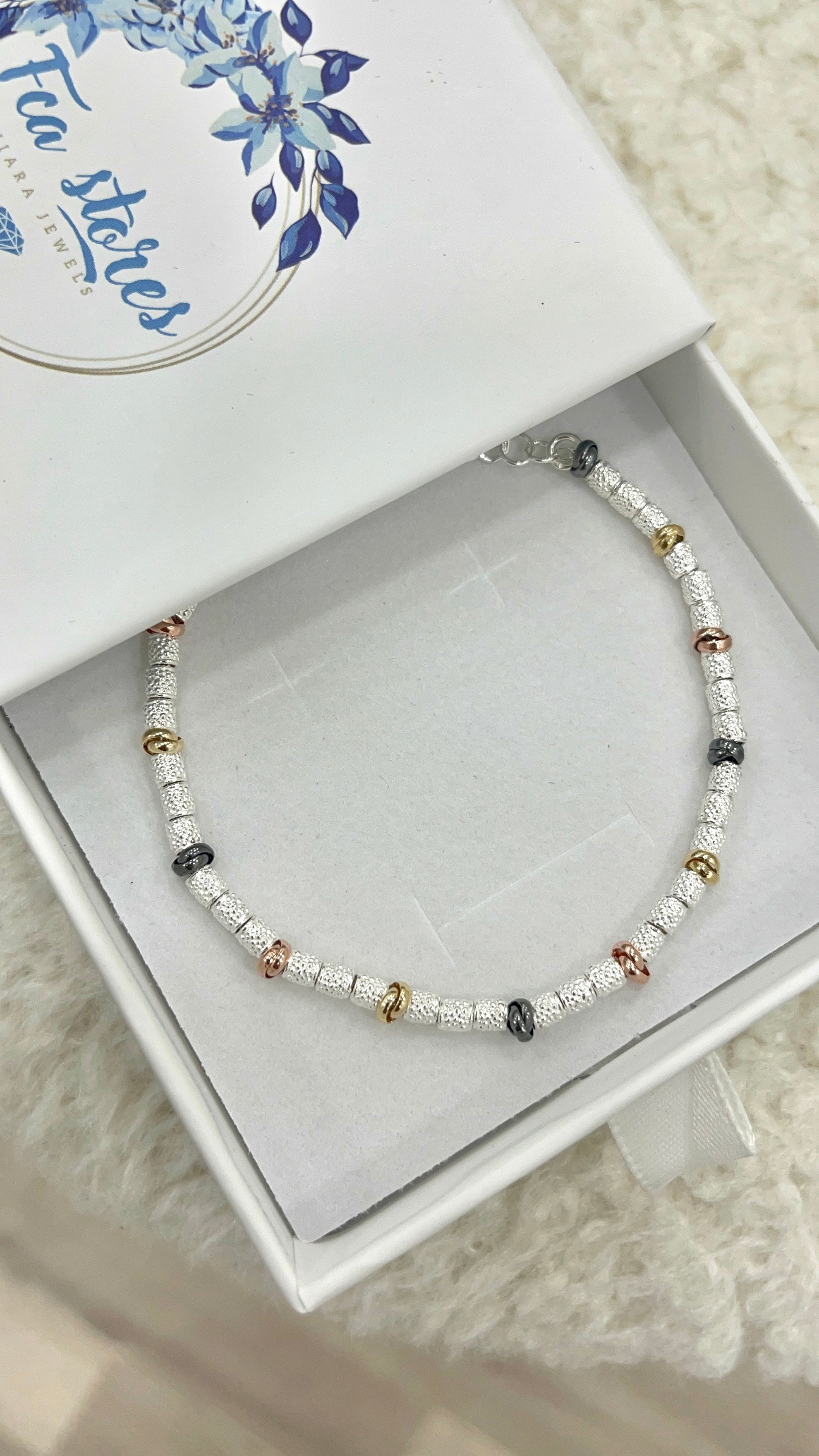 Bracciale nodini tre colori