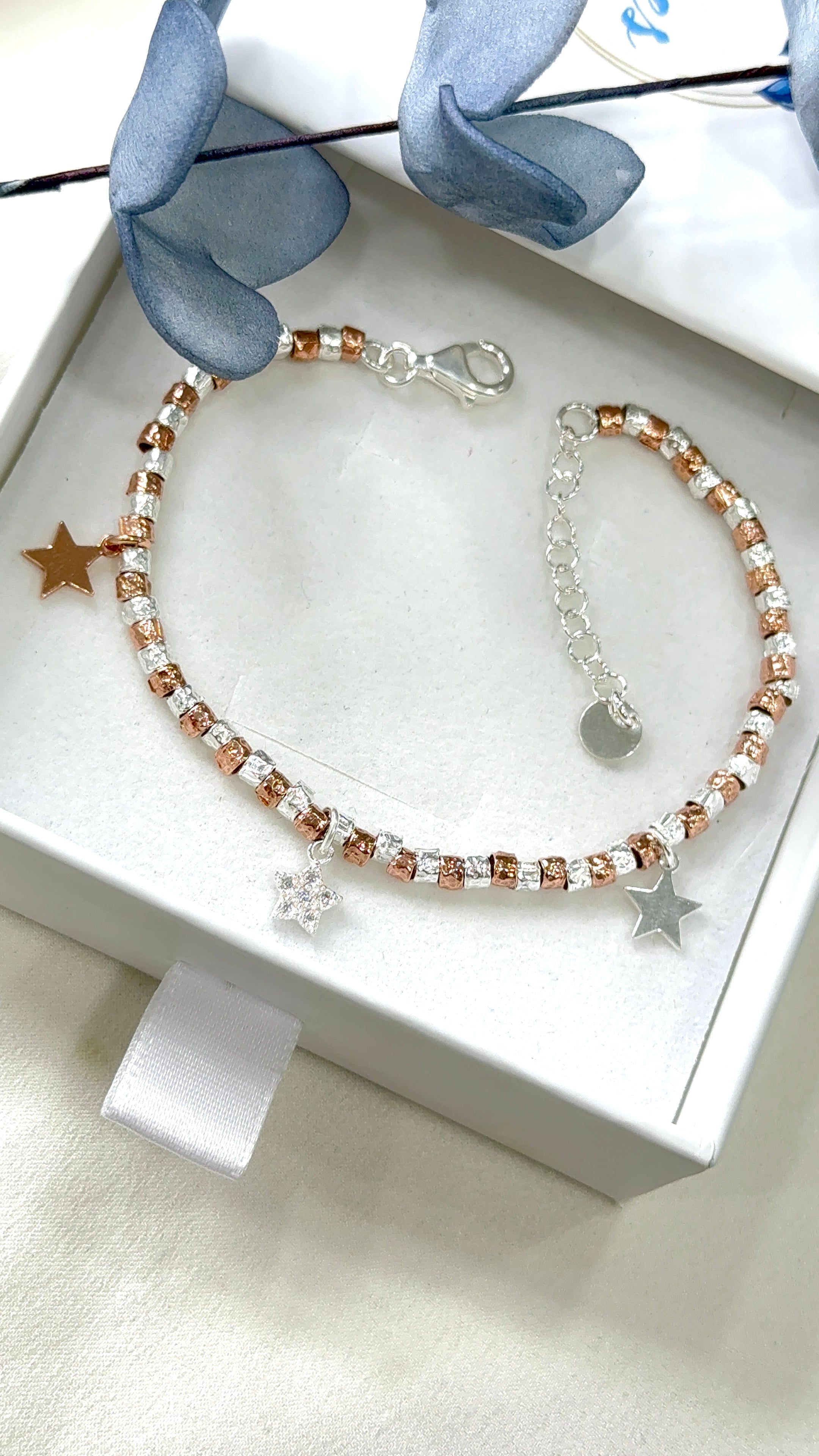 Bracciale rosa gold e Silver e charms stelline