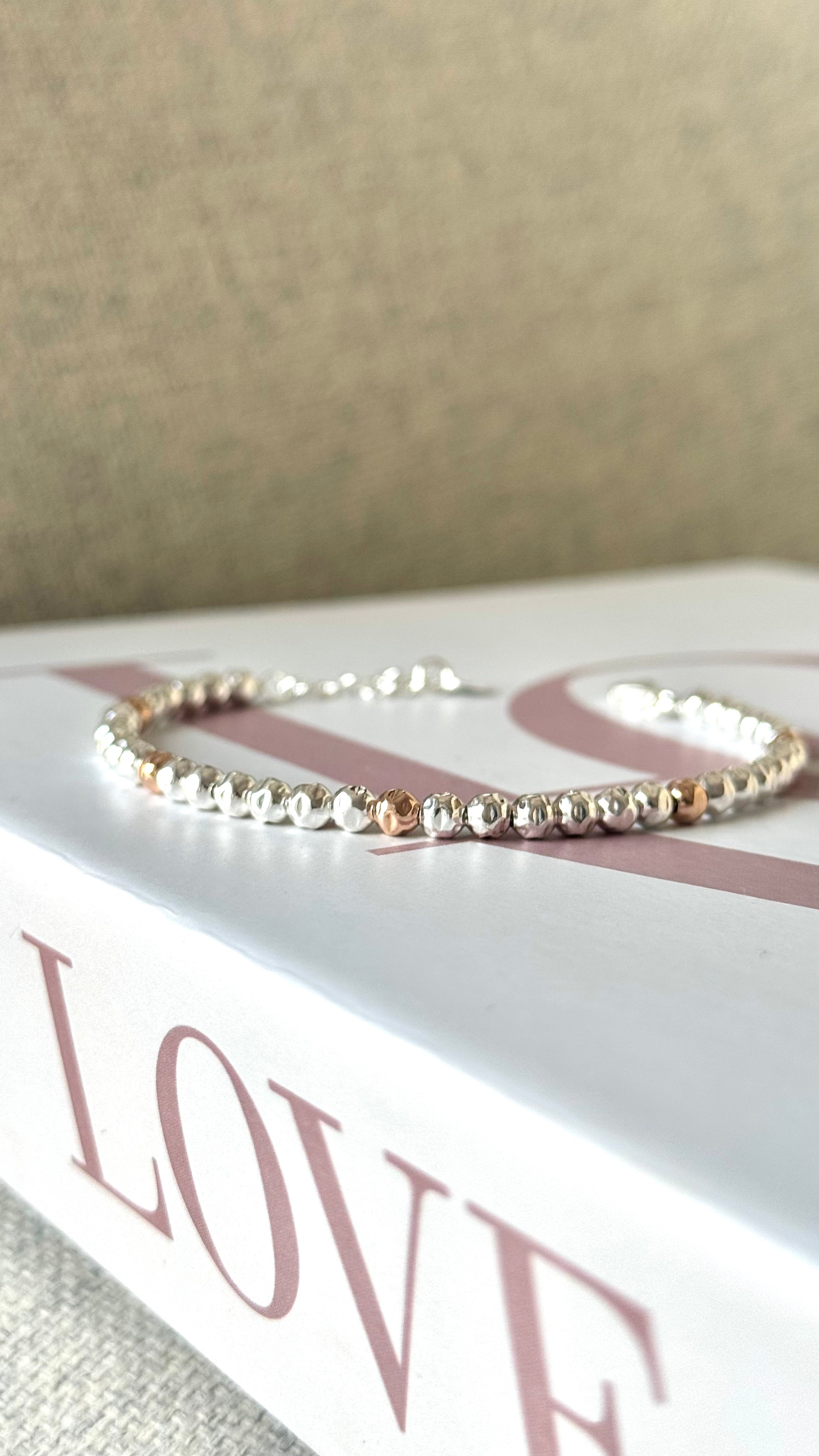 Bracciale sfere Martellate rosa gold