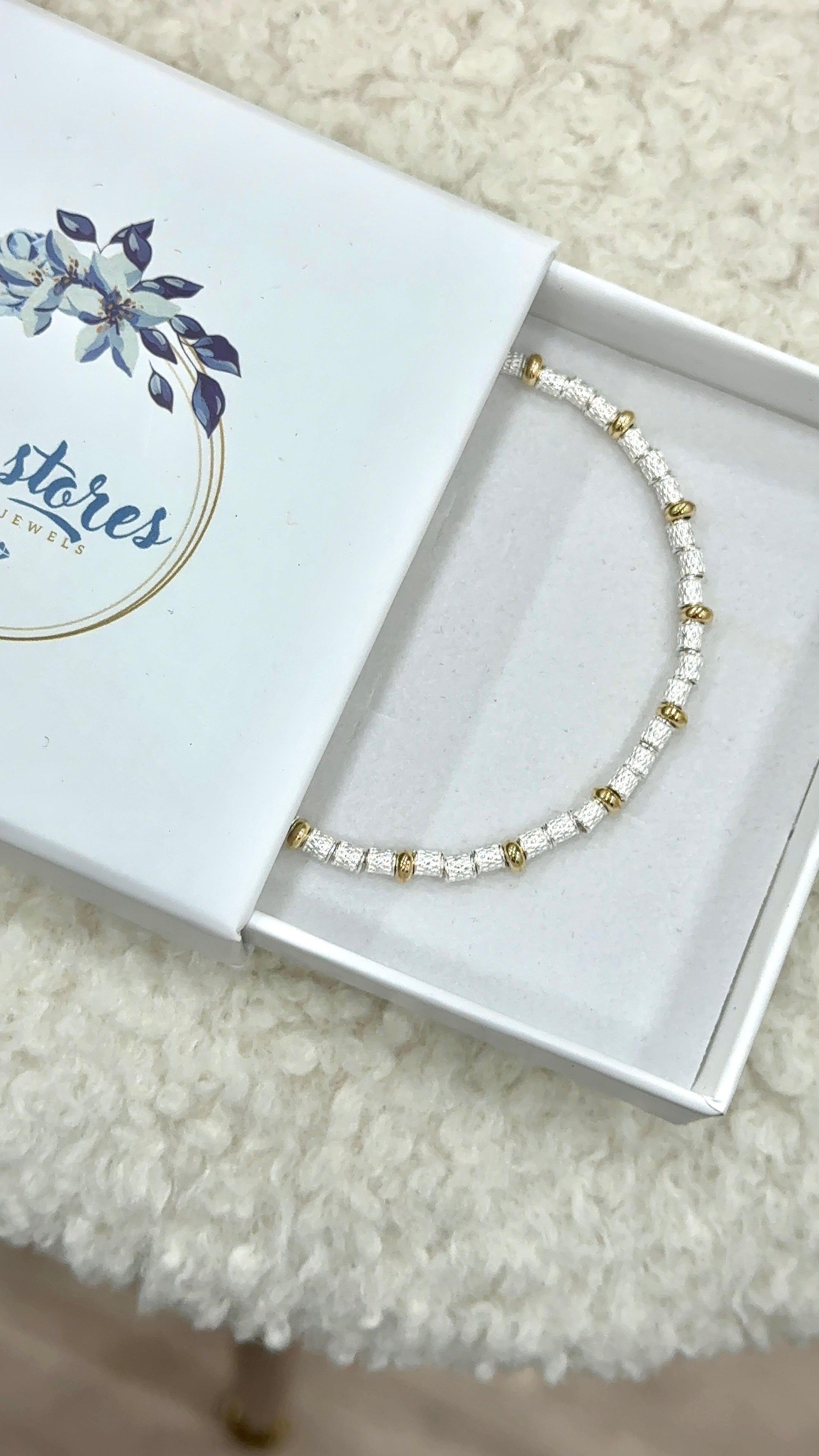 Bracciale sassolini diamantati e rondelline gold