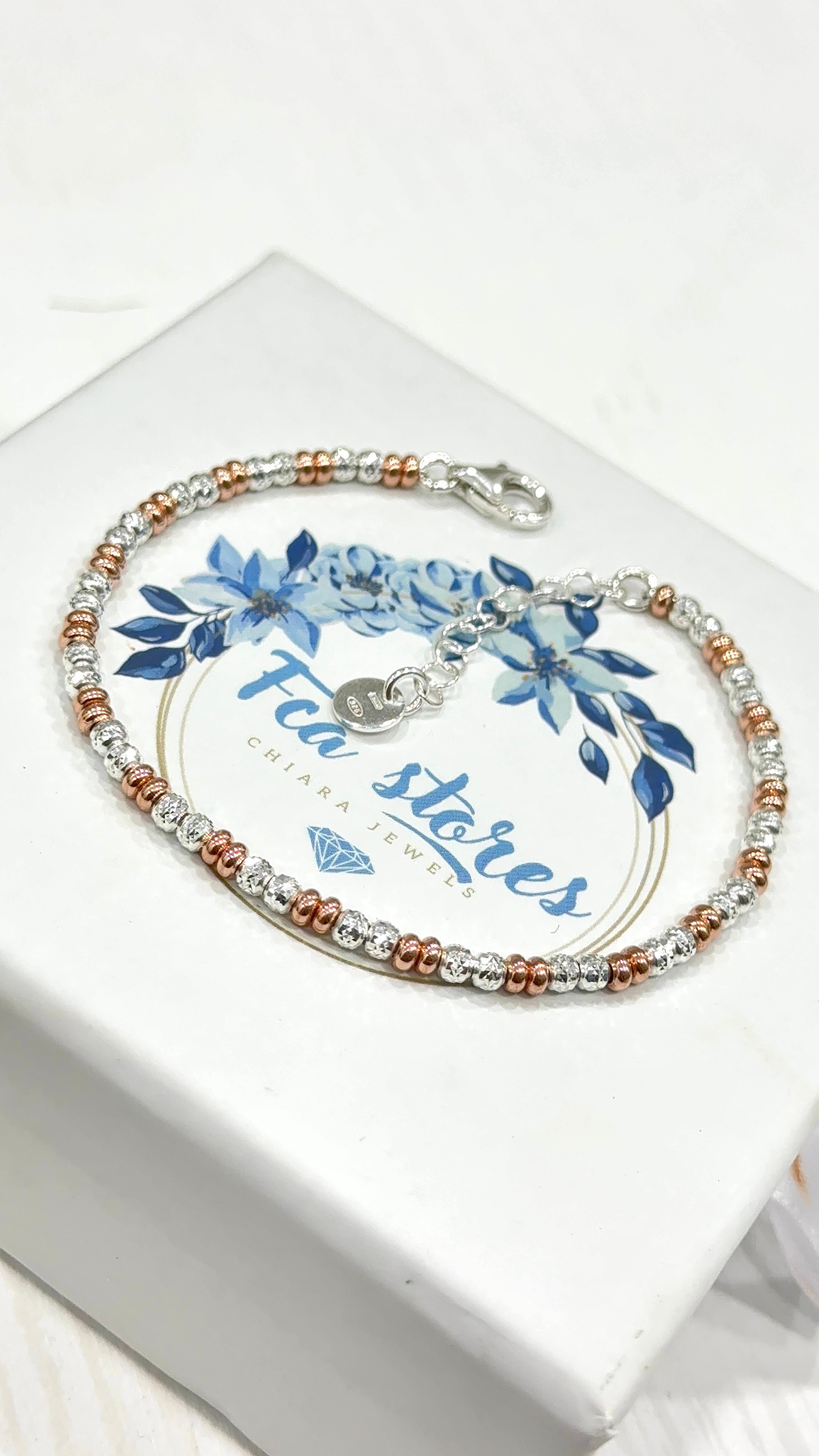 Bracciale sfere diamantate e rondelline rosa gold