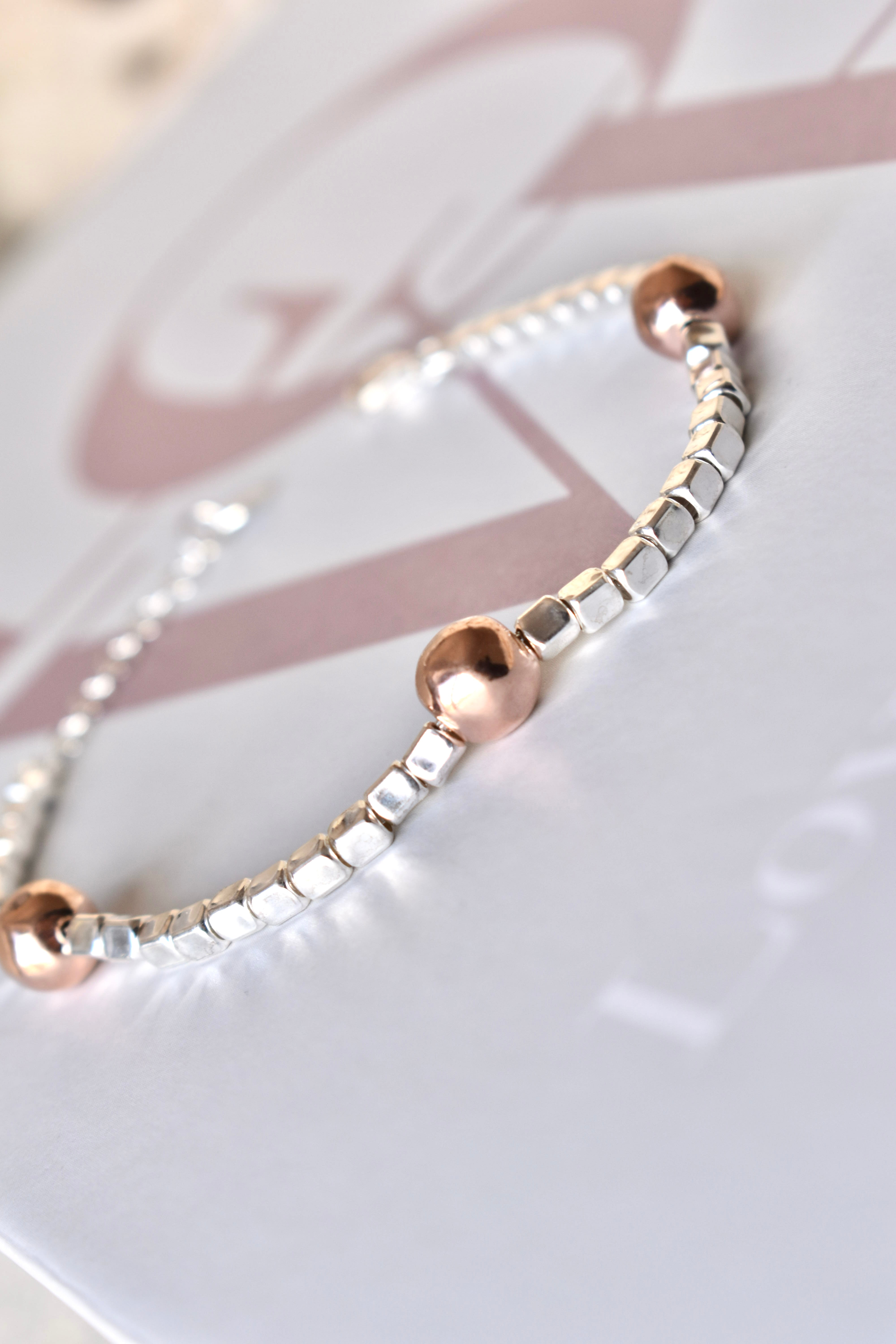 Bracciale Quadrotti e sassolini oro rosa