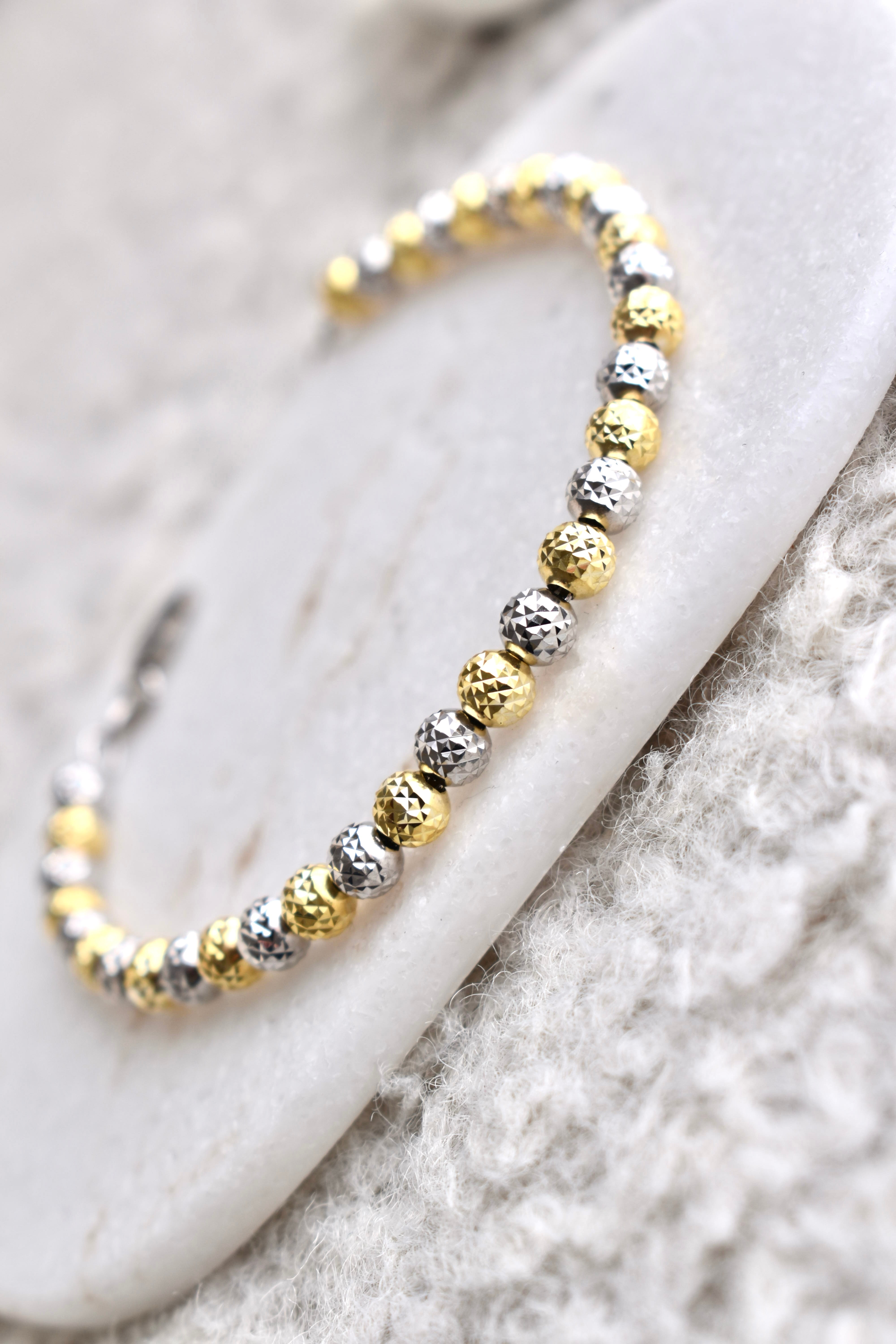 Bracciale sfere diamantate gold e rodio